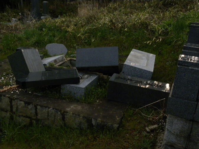 Fig. 4. Toppled-over gravestones in Kesennuma after the quake.